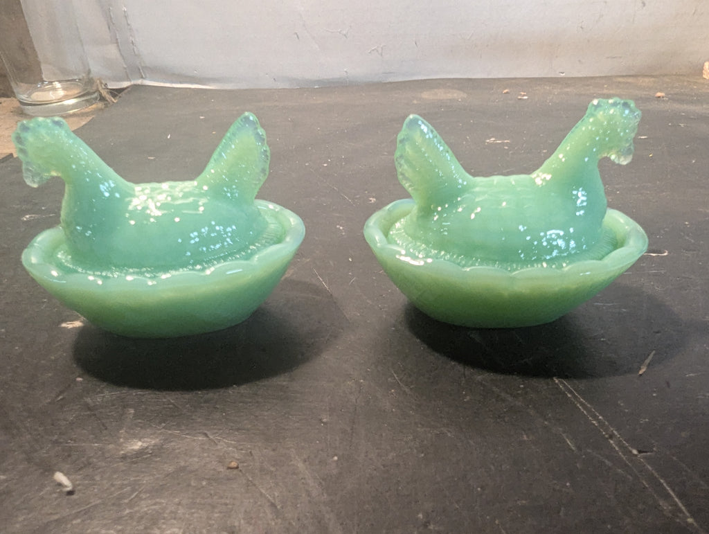 Pair of jadeite hens on nest