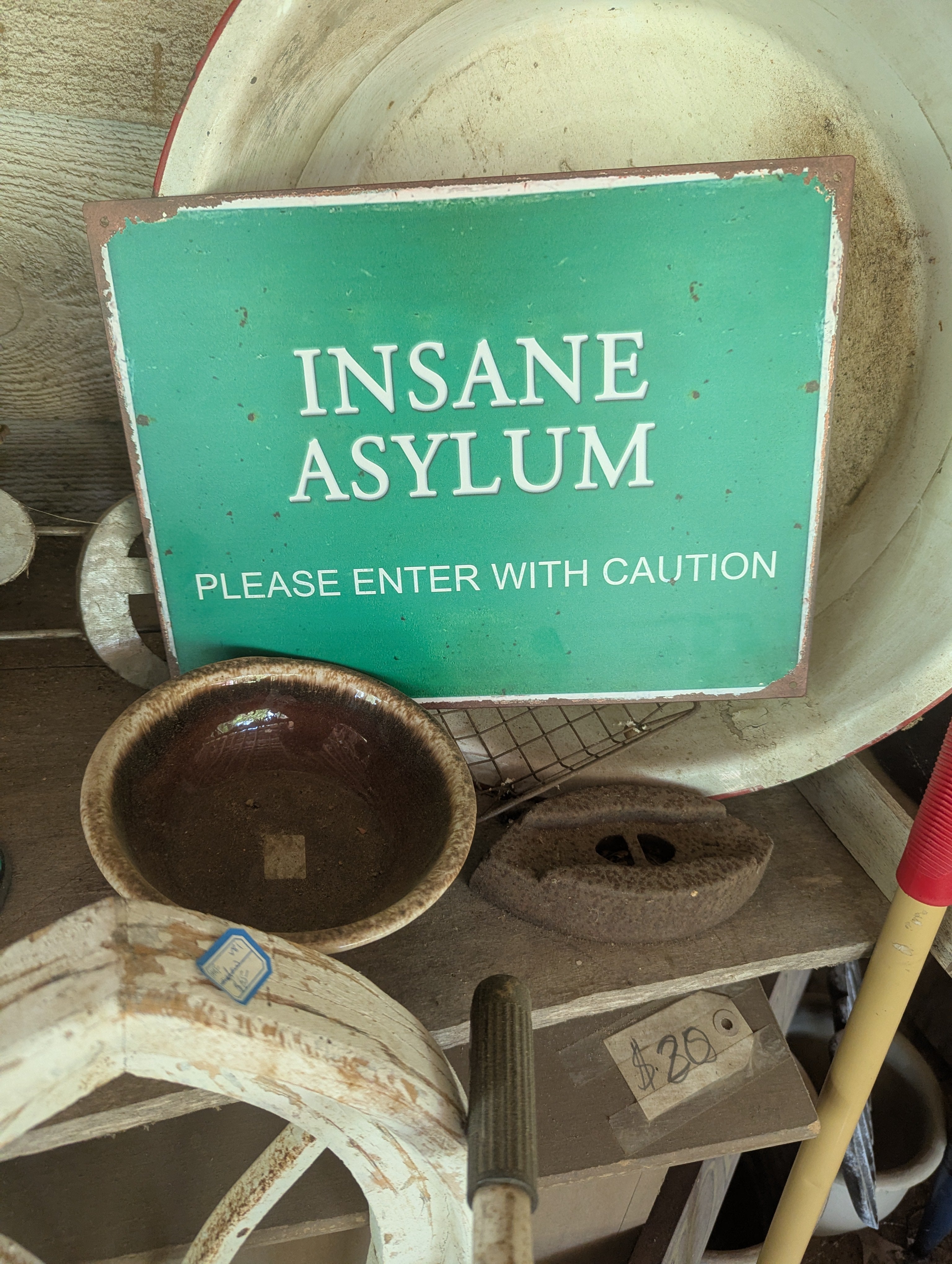 Large  tin insane asylum sign
