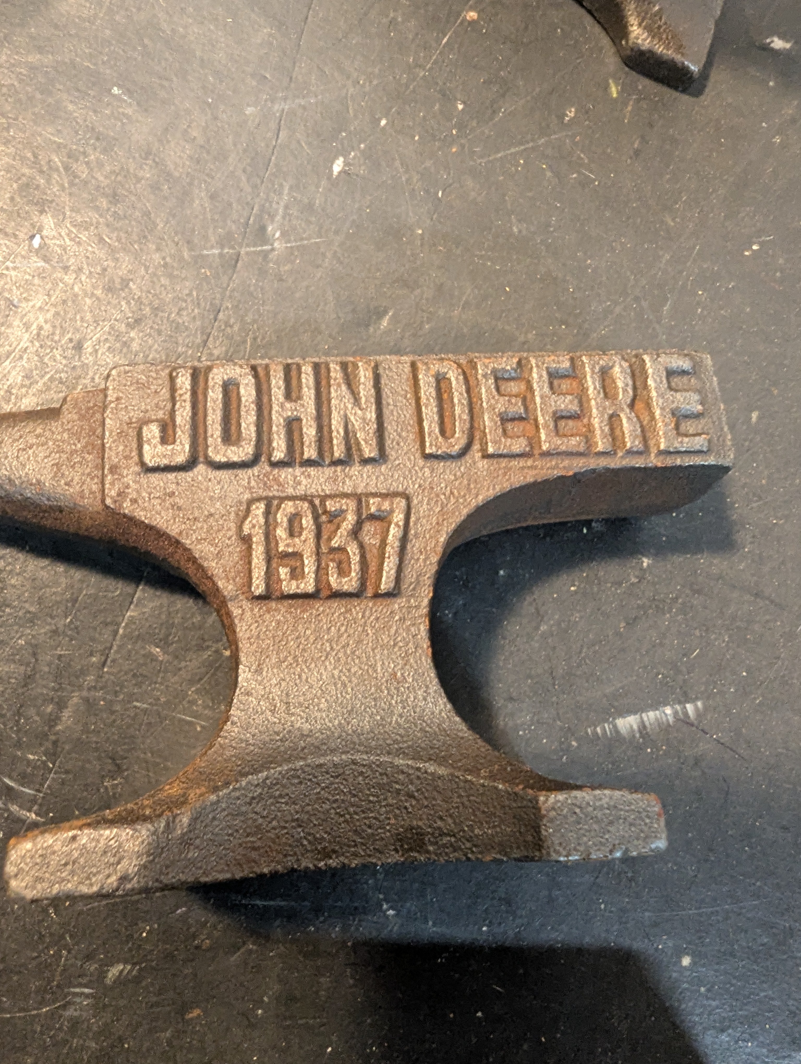 Six miniature steel anvils