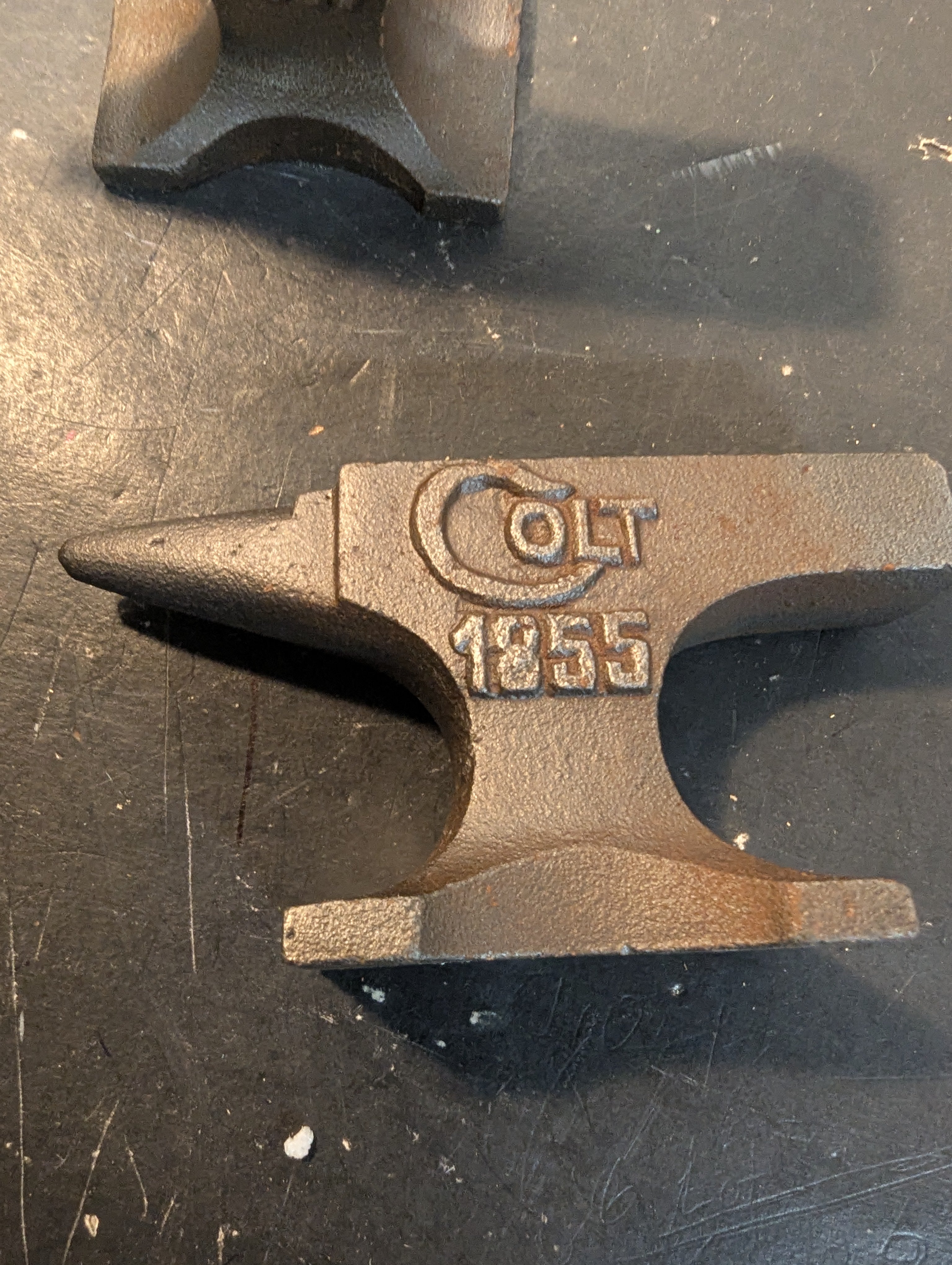 Six miniature steel anvils