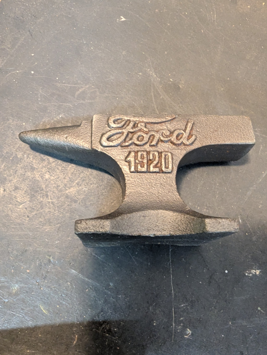 Six miniature steel anvils