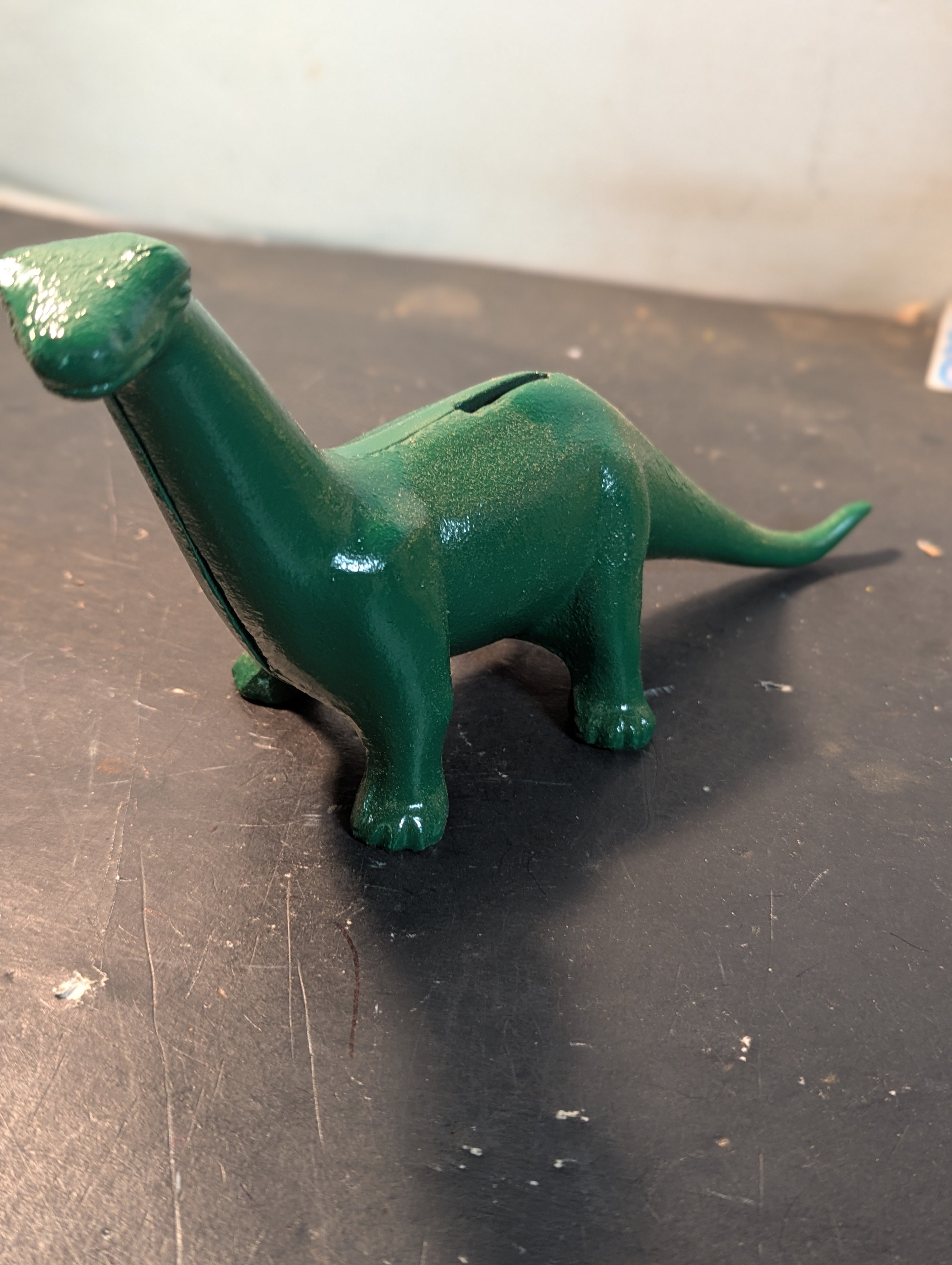 Have a cast iron Dino the dinosaur Bank