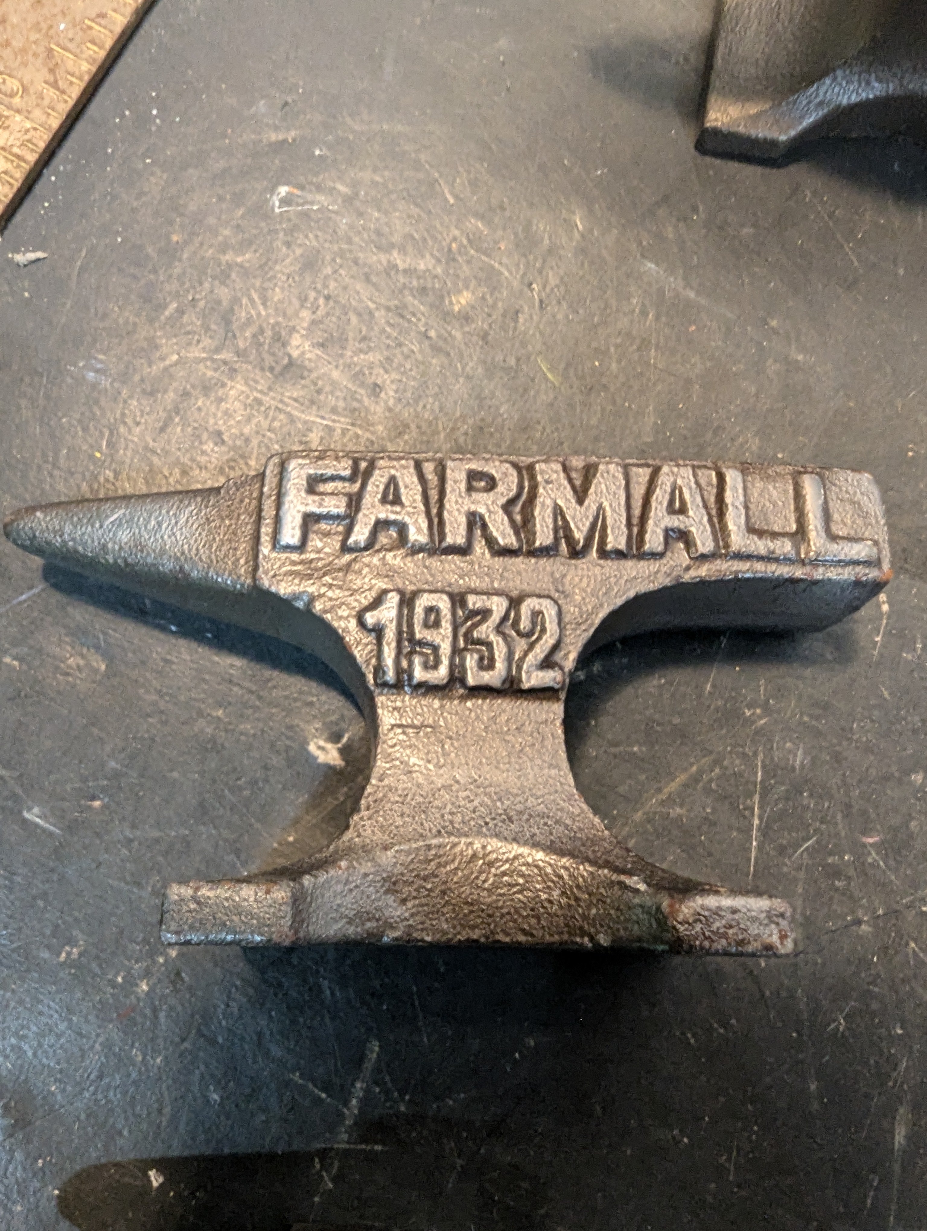 Six miniature steel anvils