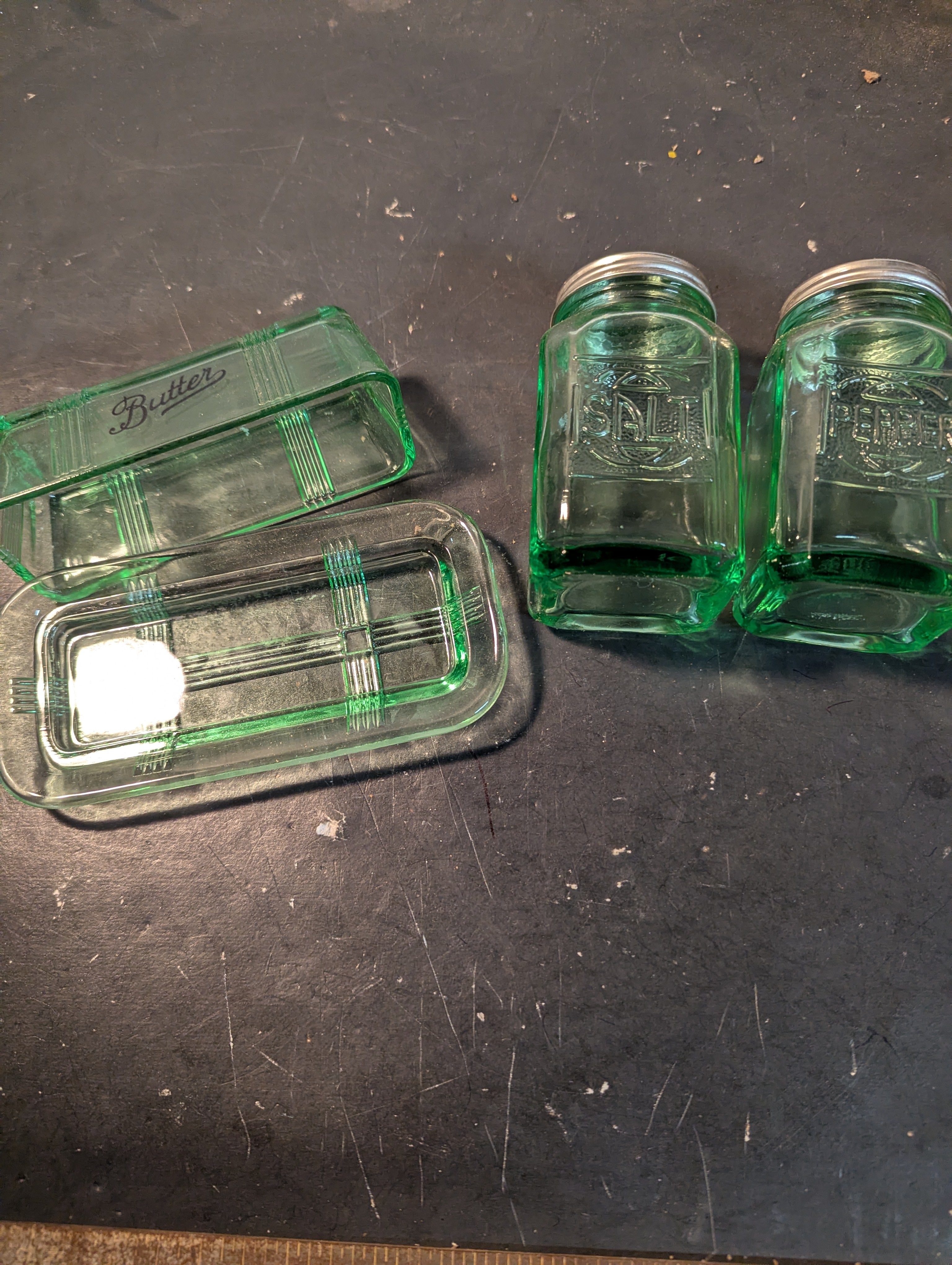 Green glass butter dish and salt and pepper shakers combo