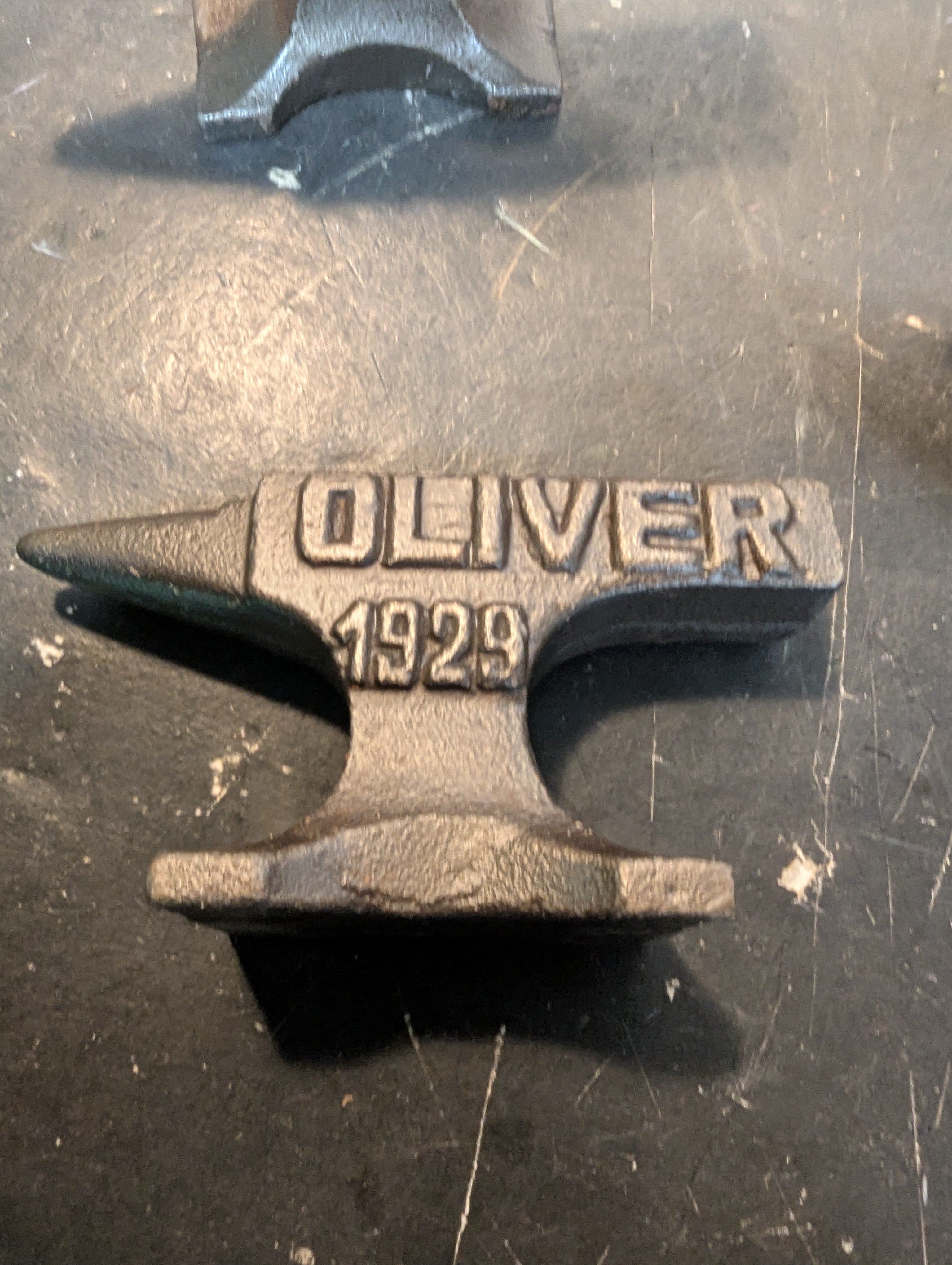 Six miniature steel anvils